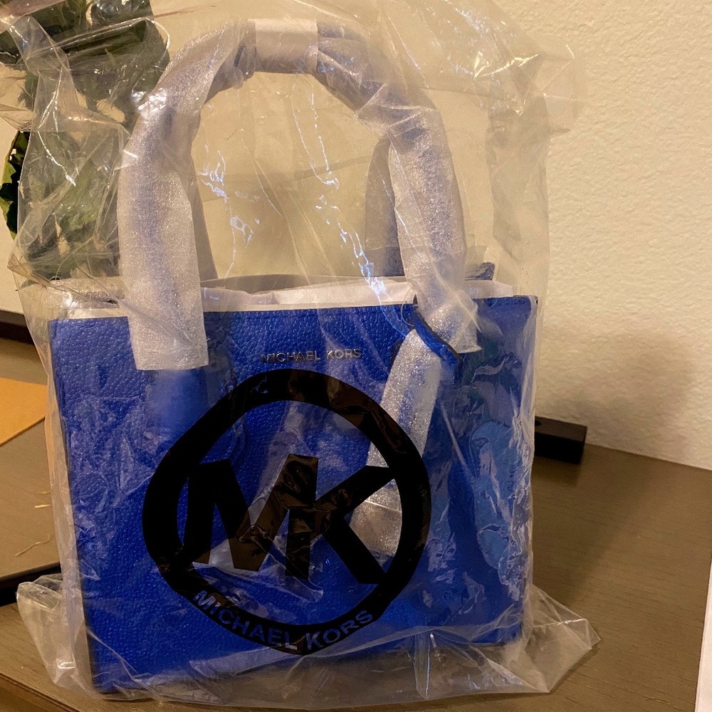 Blue crossbody Michael Kors bag